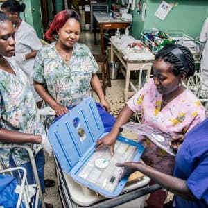 Hospital Nurse prepping the embrace heater box for use